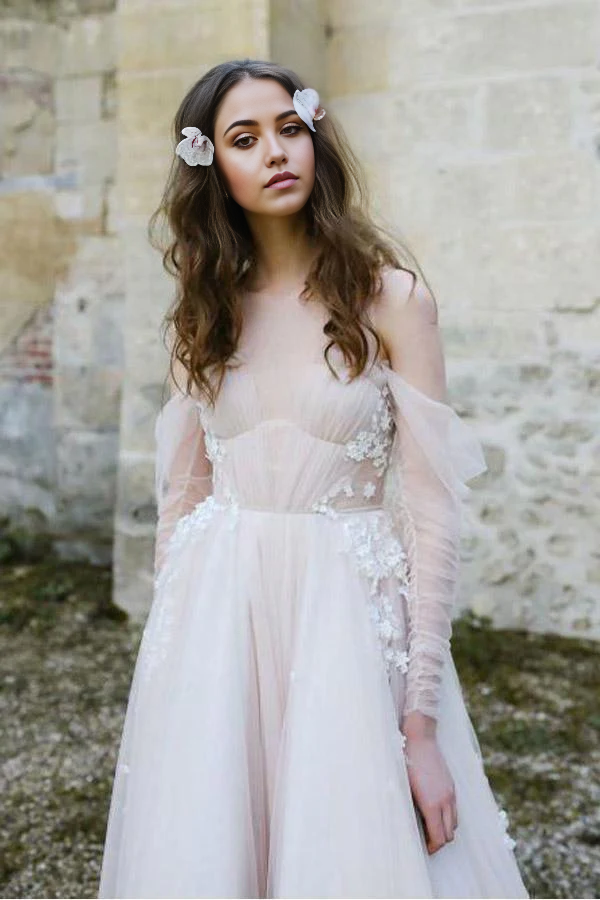 Woman wearing a Boho Rustic V-Neck Long Sleeve Cold Shoulder Beach Wedding Dress.