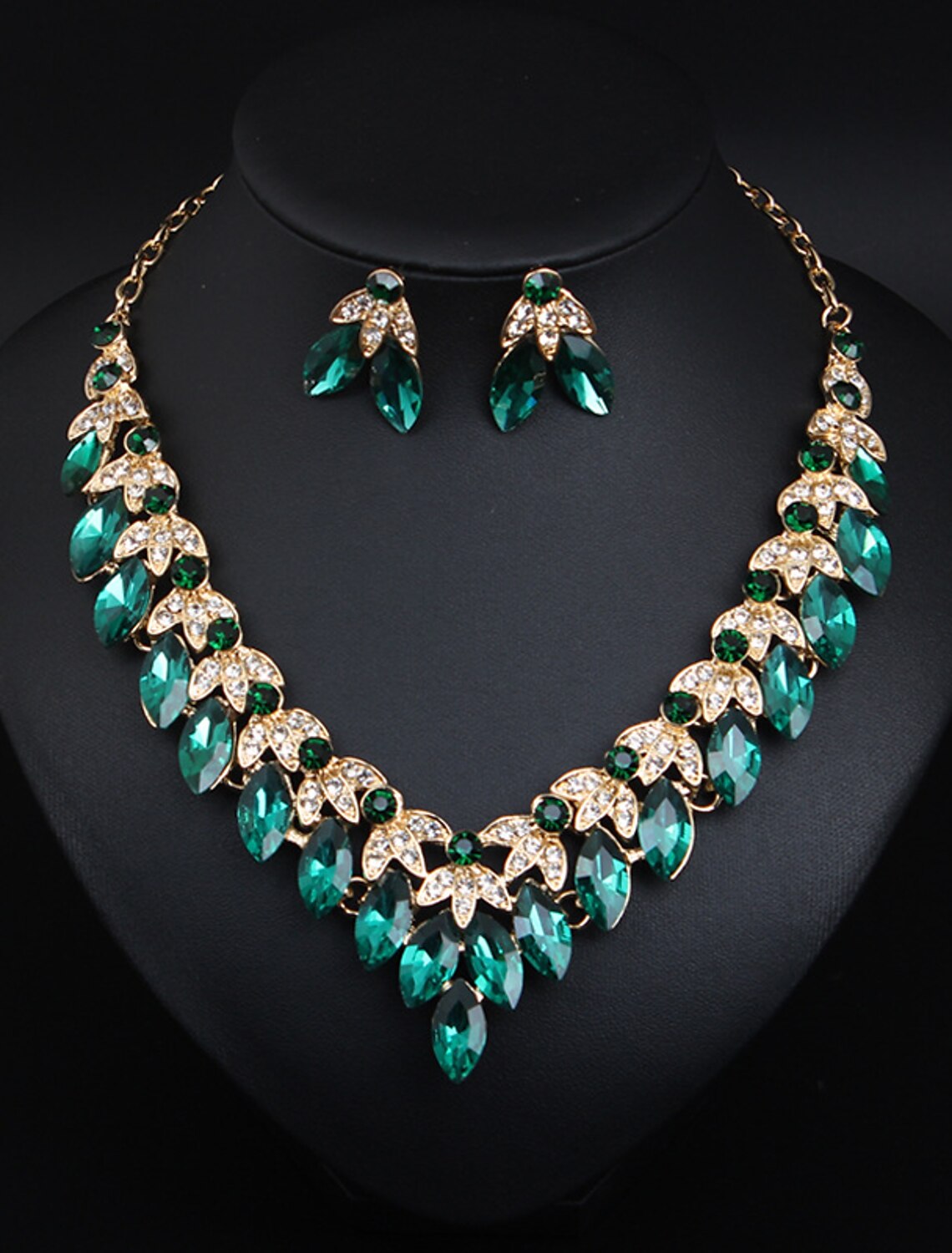 Elegant bridal jewelry set featuring a crystal rhinestone flower necklace and matching earrings.