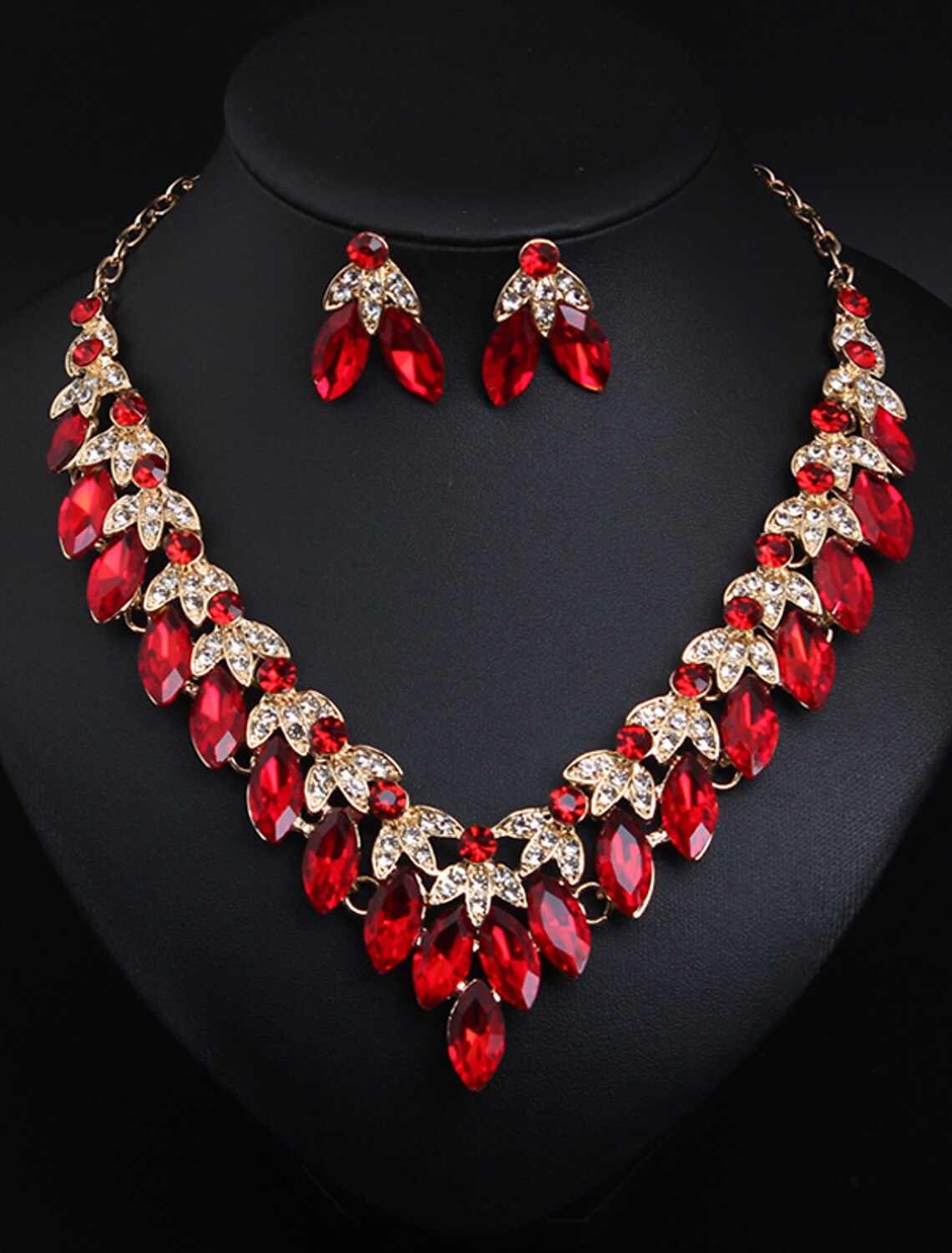 Detailed view of the matching crystal rhinestone flower earrings from the jewelry set.