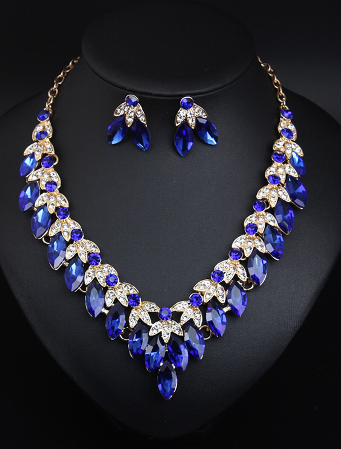 Model wearing the crystal rhinestone flower necklace and earrings set for a wedding.