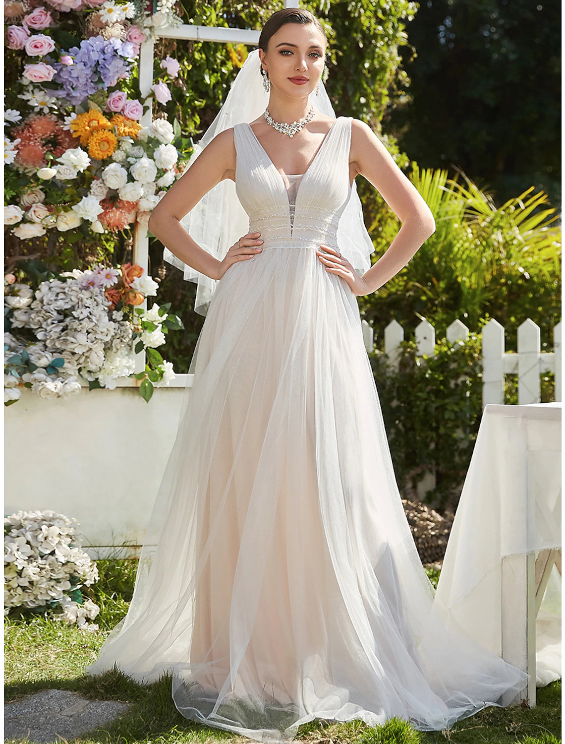 Back view of the A-Line V-Neck tulle wedding dress, showing the train.