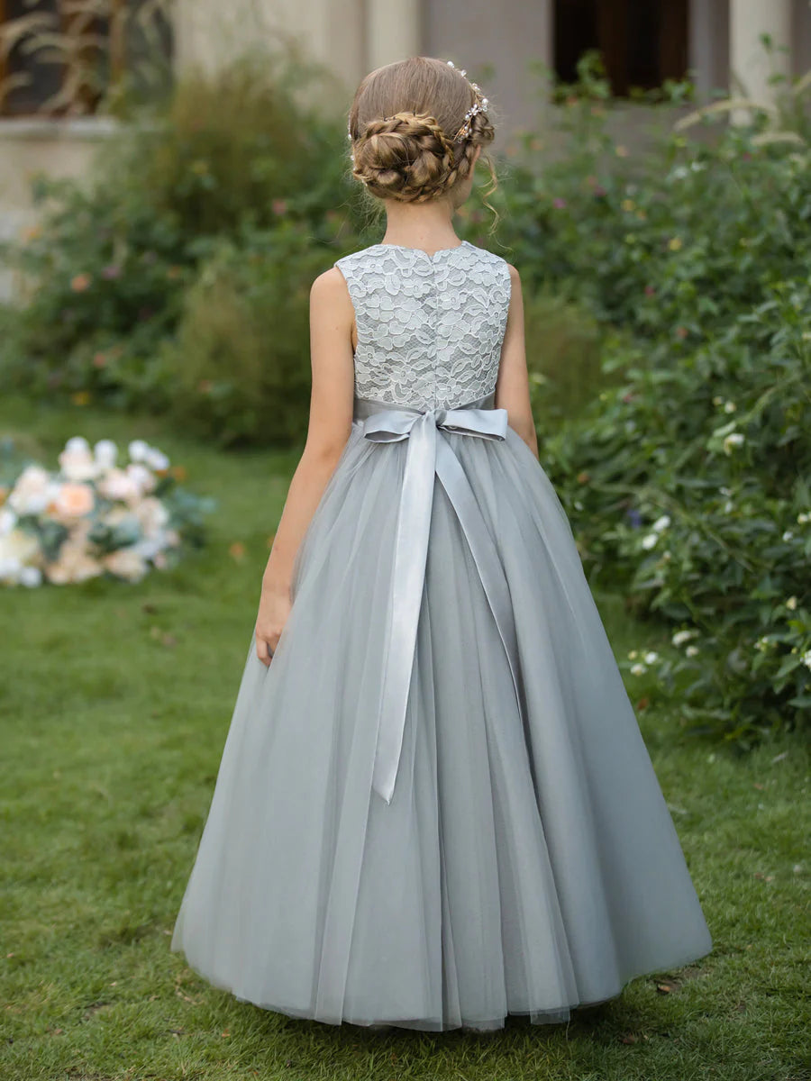 Back view of the elegant tulle flower girl dress, showing the sash tied.