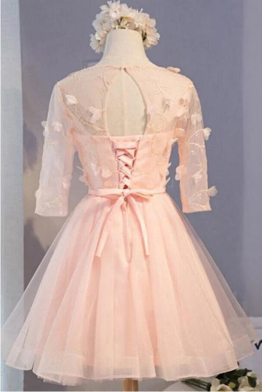Front view of an A-Line half sleeve tulle prom dress with floral details.