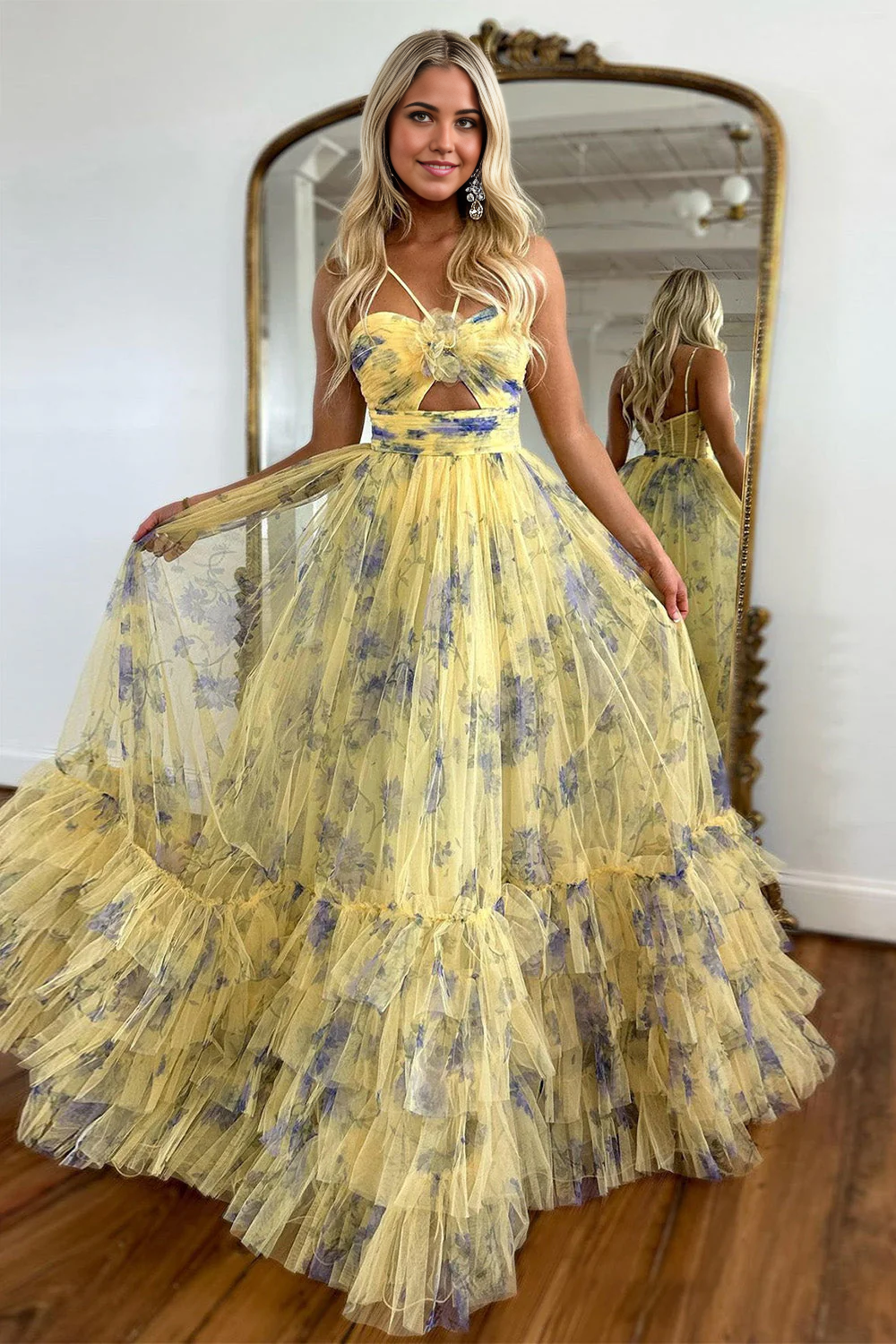 Yellow A-line halter neck tulle prom dress with ruffles.