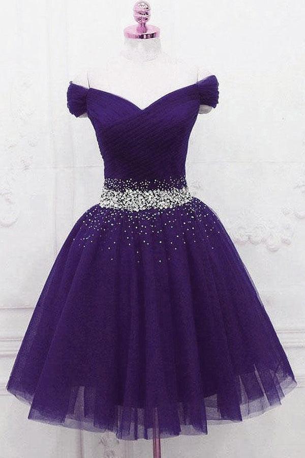 Side view of an A-line off-shoulder tulle homecoming dress with beading.