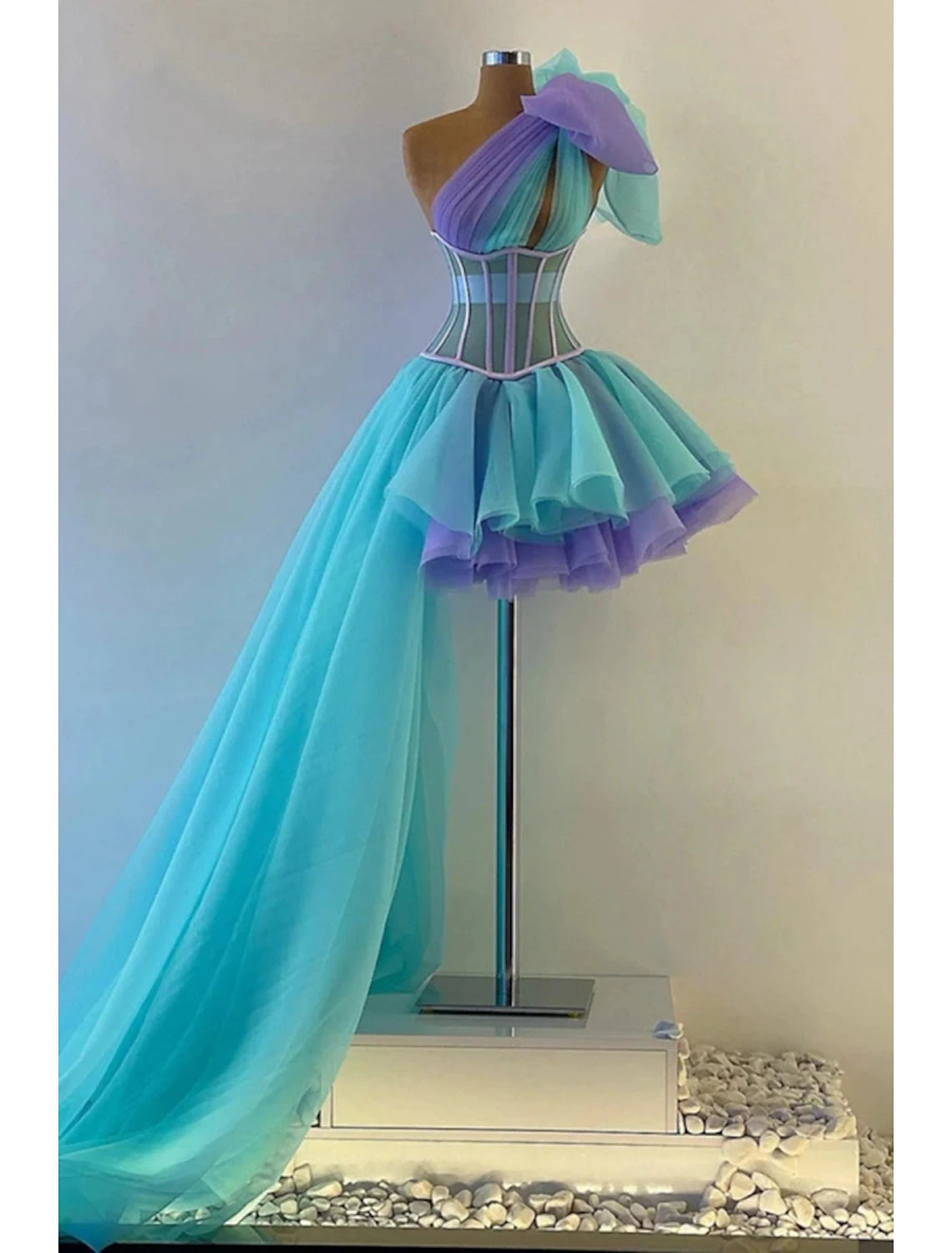 A-Line one-shoulder Quinceanera dress with pleats and a bow.