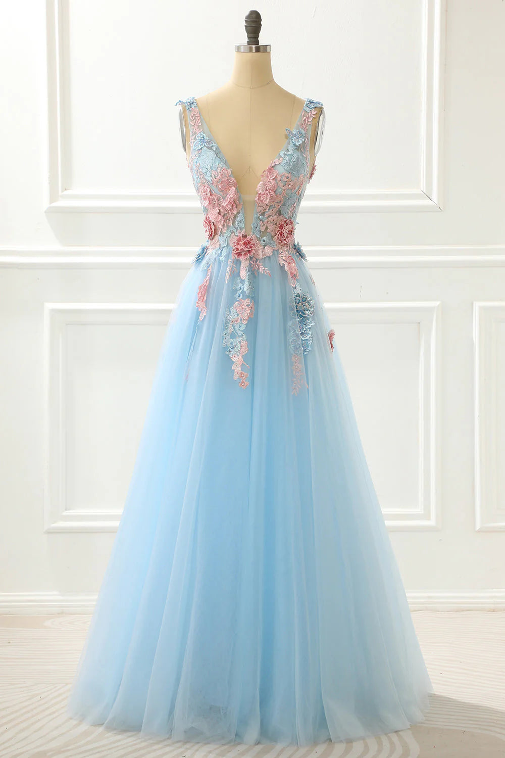 Light blue A-line princess prom dress with appliques.