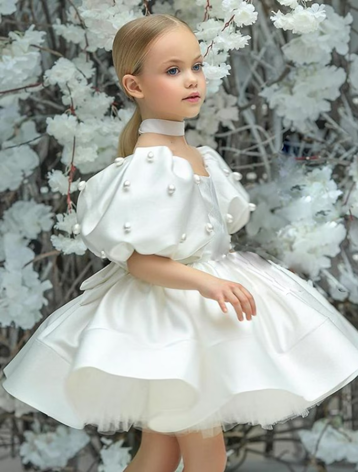 Mint green A-line dress with ruched mesh puff sleeves.