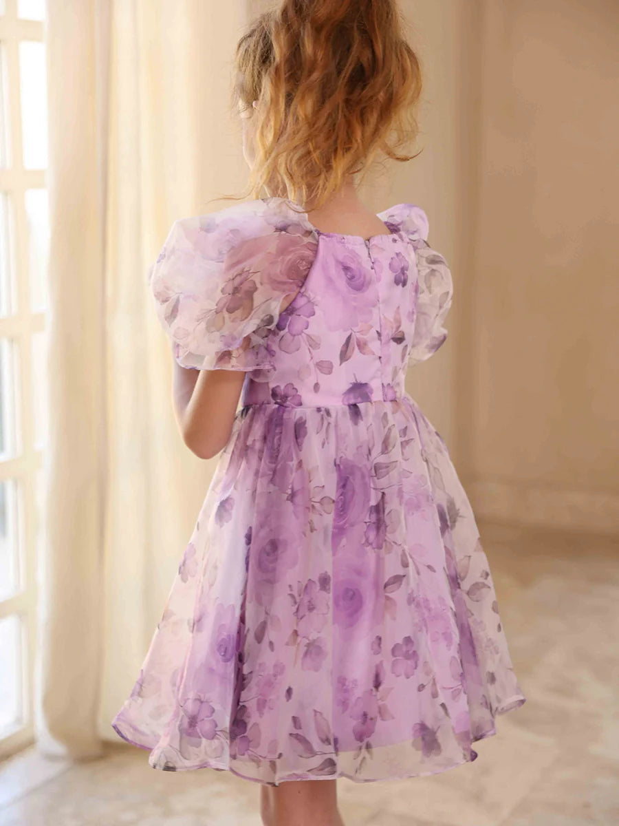 Back view of the A-line flower girl dress, showcasing its elegant silhouette.