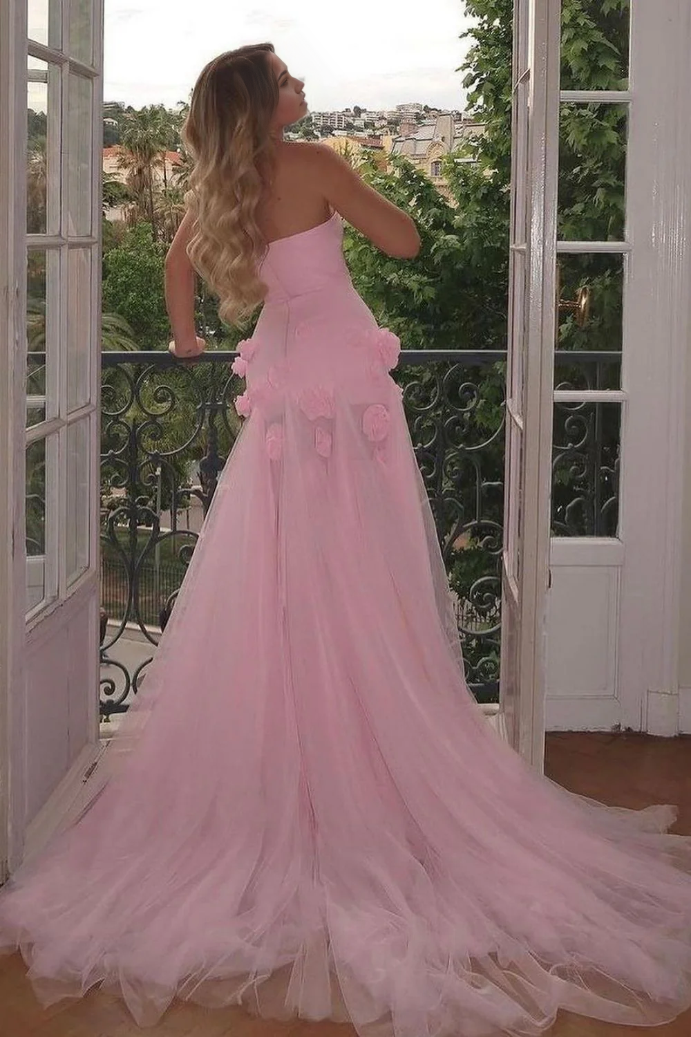 Back view of the elegant pink tulle formal gown.