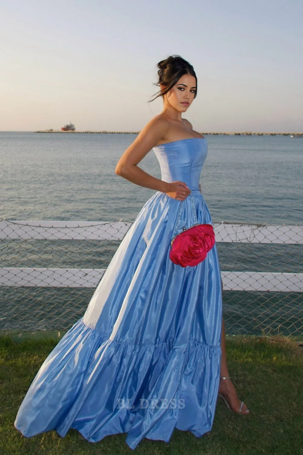 Back view of the blue satin A-line strapless long formal dress.