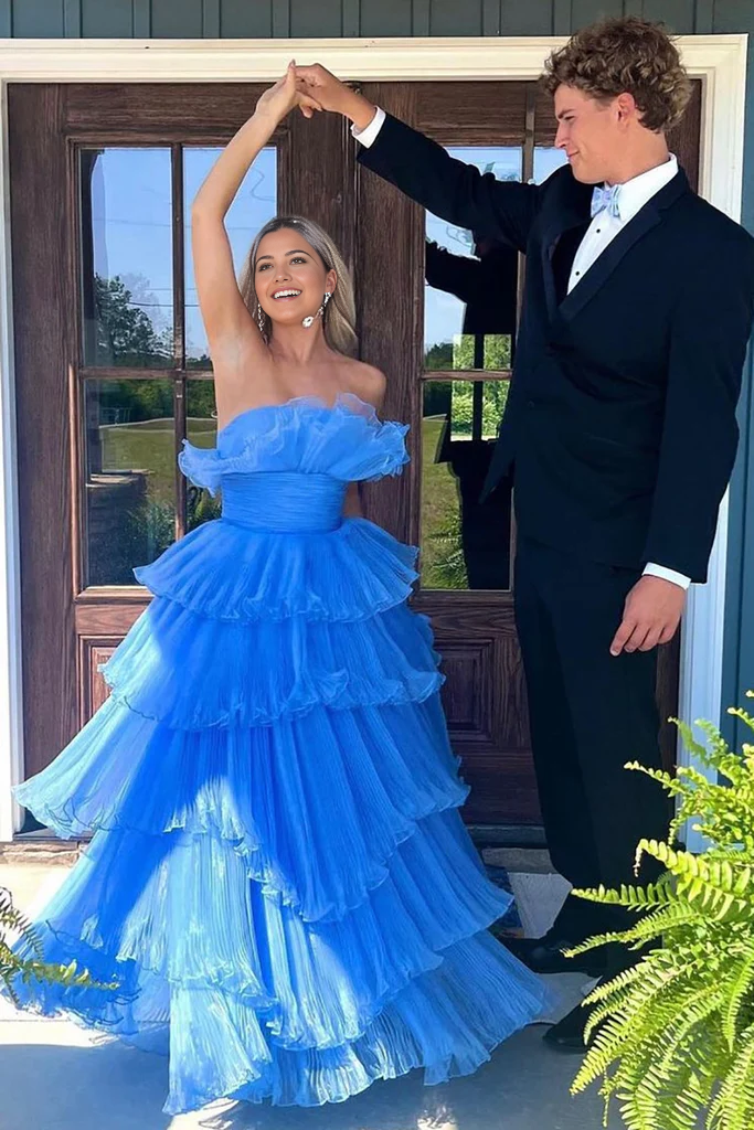 Side view of the A-Line strapless blue long prom dress.