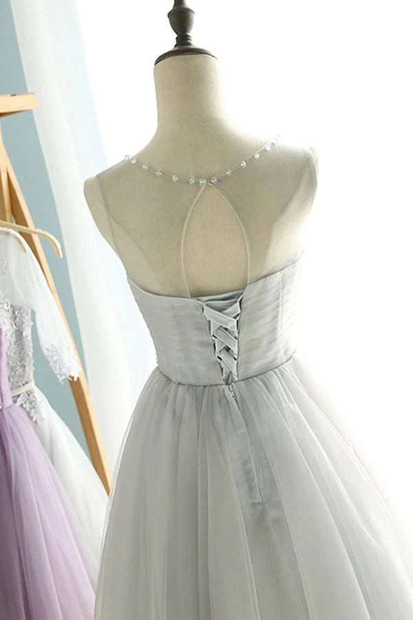 Back view of A-line sweetheart lace-up pleated homecoming dress with lace-up detail.
