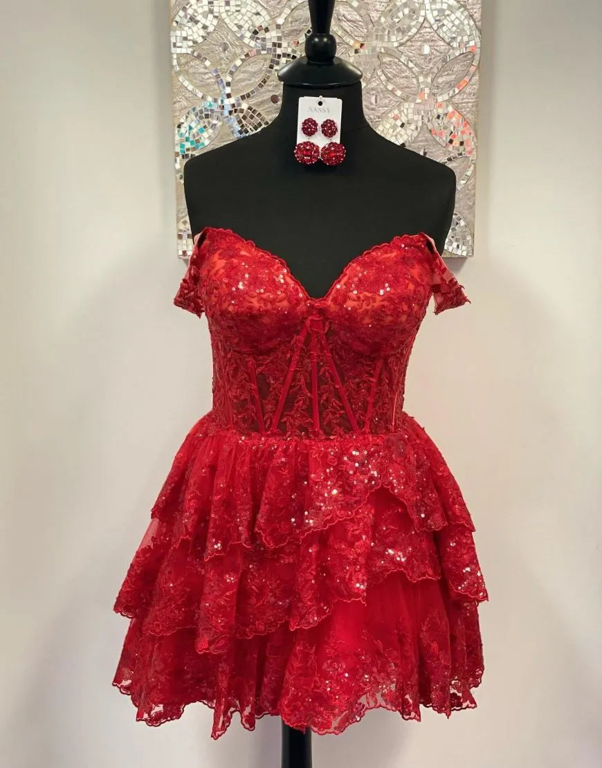 A-line tiered short homecoming dress with appliques.