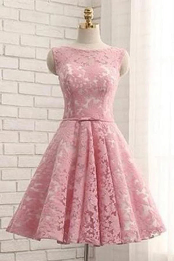 Light pink A-line V-neck homecoming dress with floral appliques.