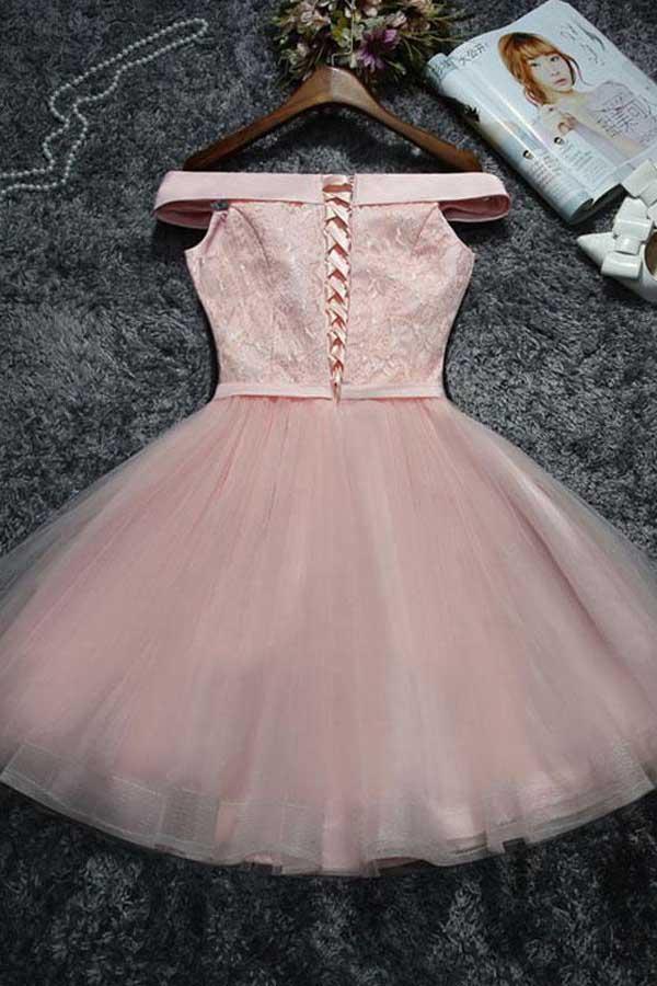 Side view of a short A-line lace and tulle homecoming dress with short sleeves.