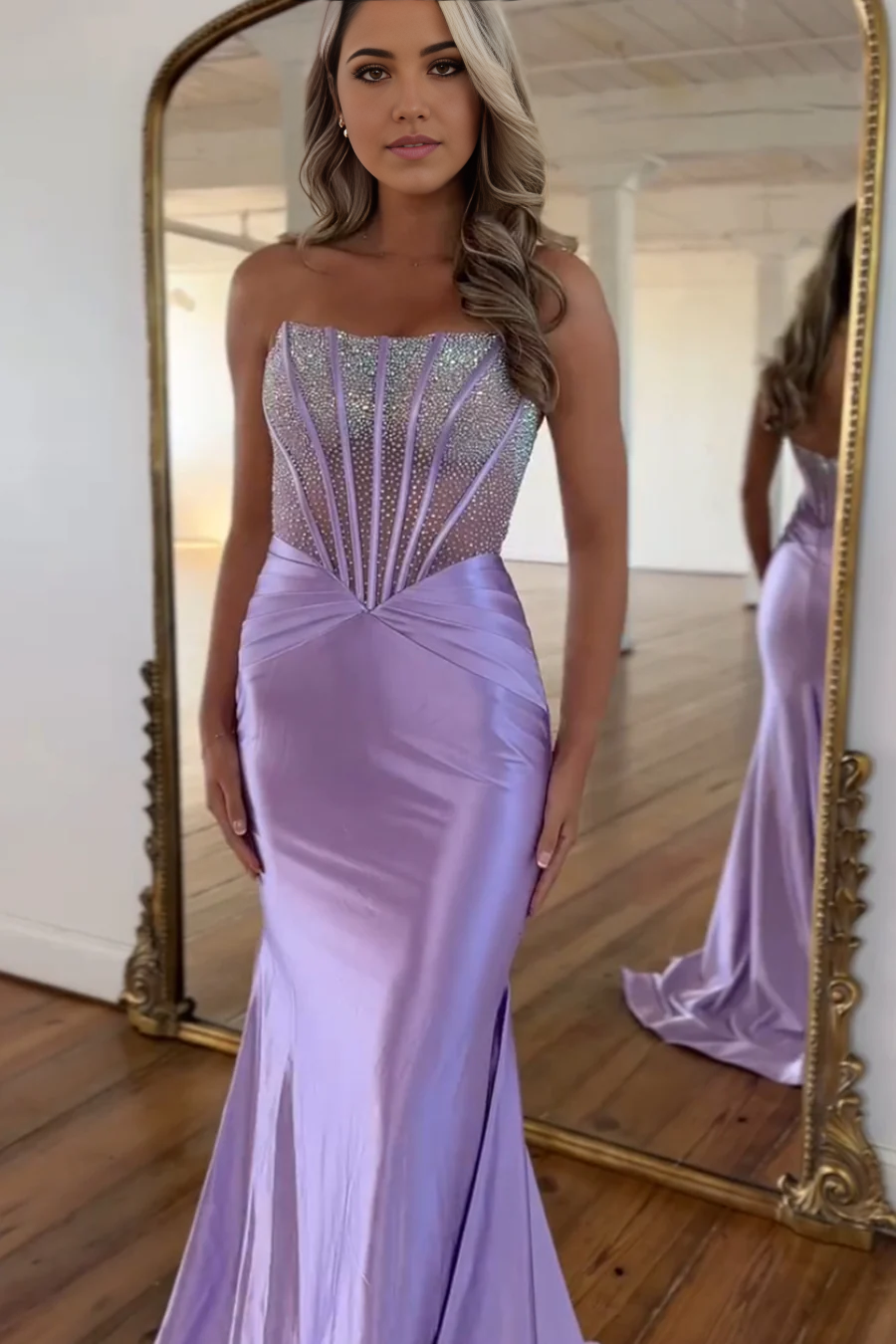 Woman wearing a lavender mermaid scoop neck long prom dress.