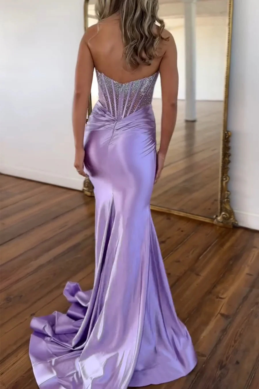 Lavender mermaid formal dress with scoop neck.