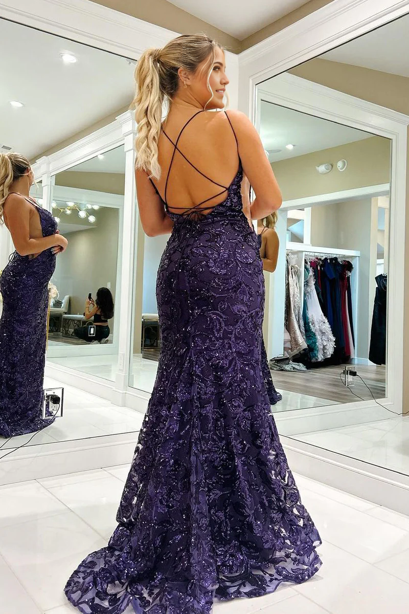Close-up of shimmering sequin detail on a purple V-neck dress.