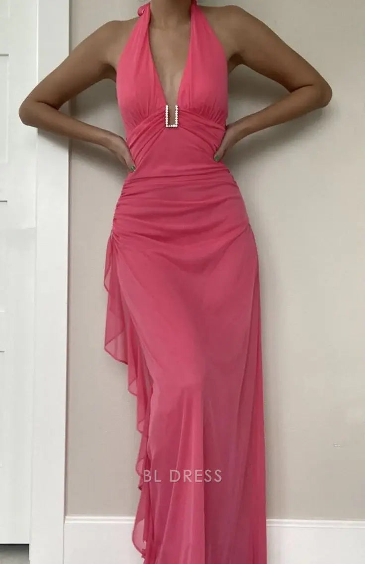 Woman wearing a charming pink V-neck sheath maxi dress with chiffon ruffles.