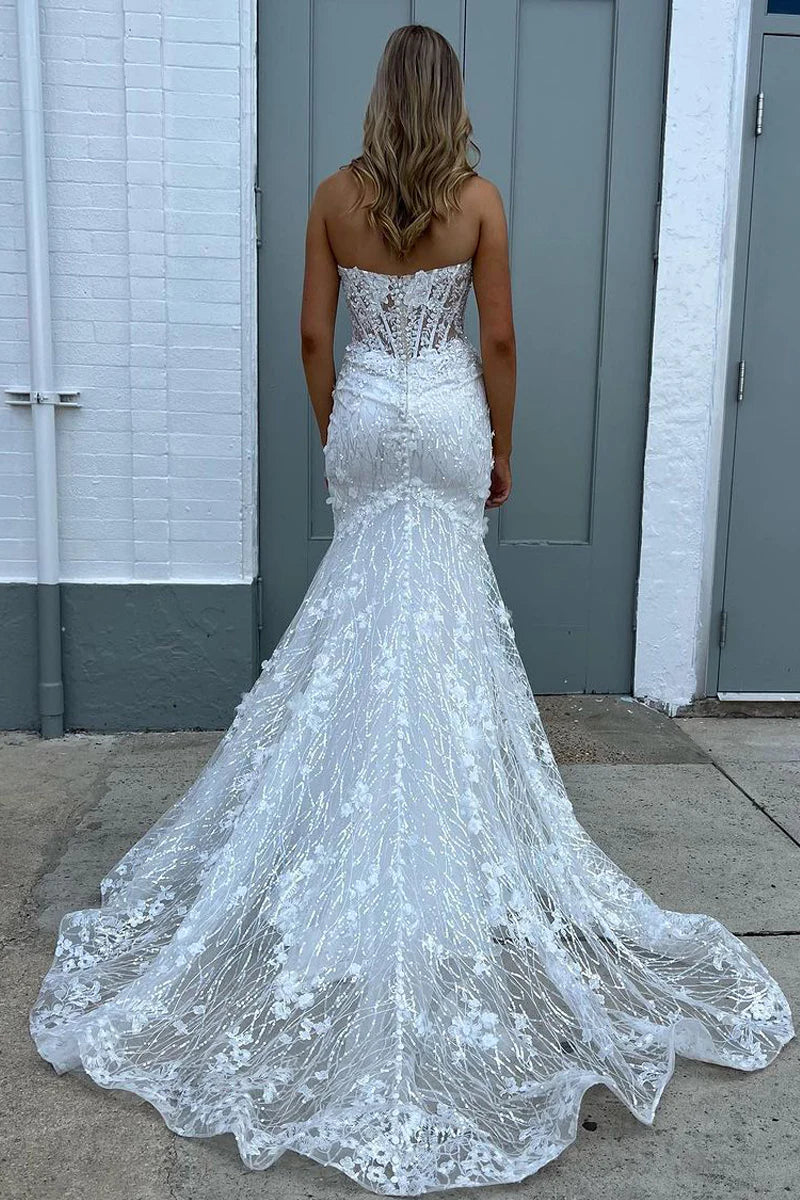 Close-up of the sparkly white sequin fabric on the mermaid dress.