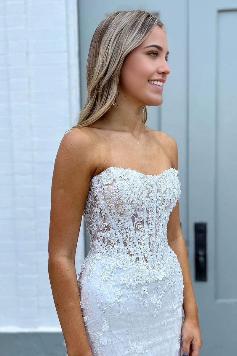 Back view of the long white sequin mermaid prom dress.