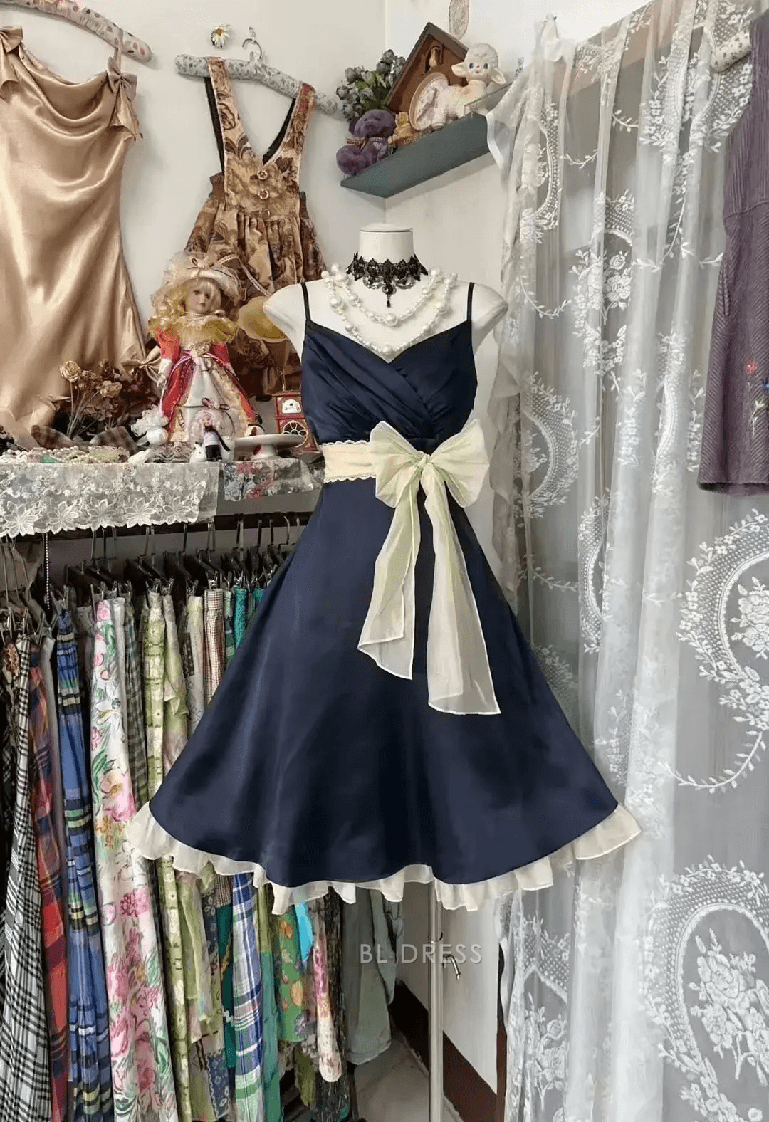 Charming A-Line Sweetheart Sleeveless Bow-Accent Navy Blue Short Homecoming Dress