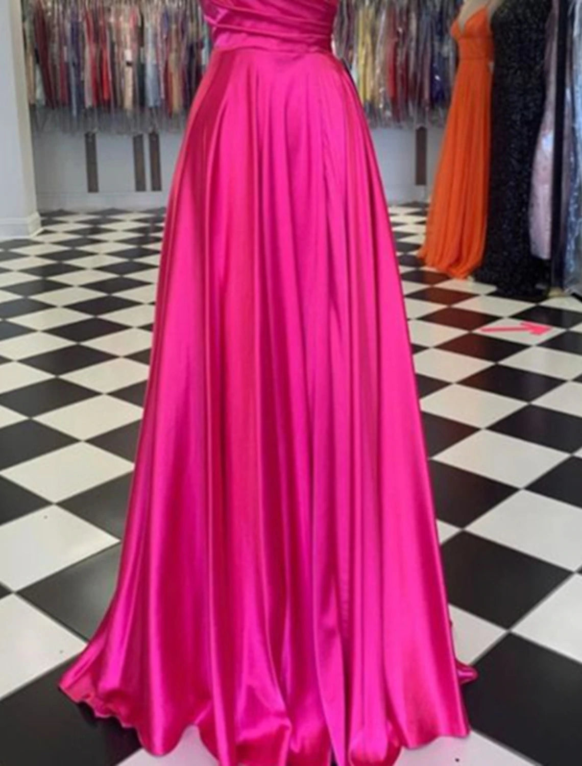 Back view of the elegant A-line charmeuse dress, showing the flowing skirt.