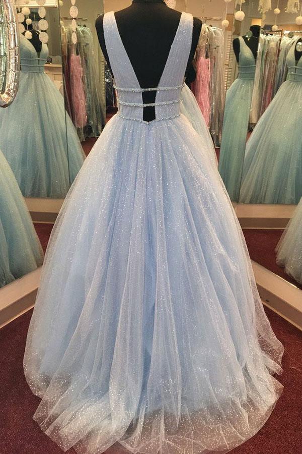 Close-up of intricate beading on the pink tulle prom dress.