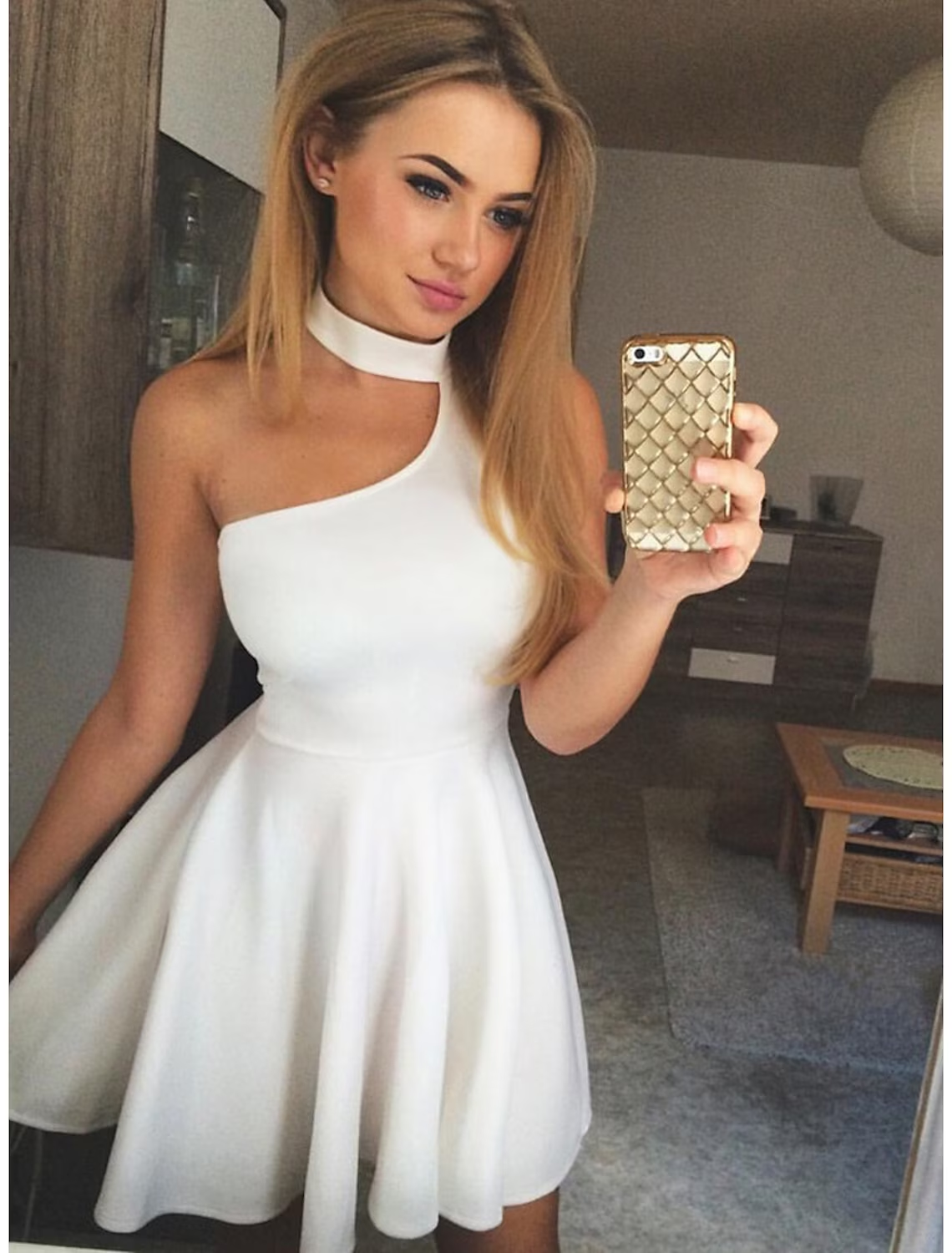 A-line halter mini cocktail dress with pleats.