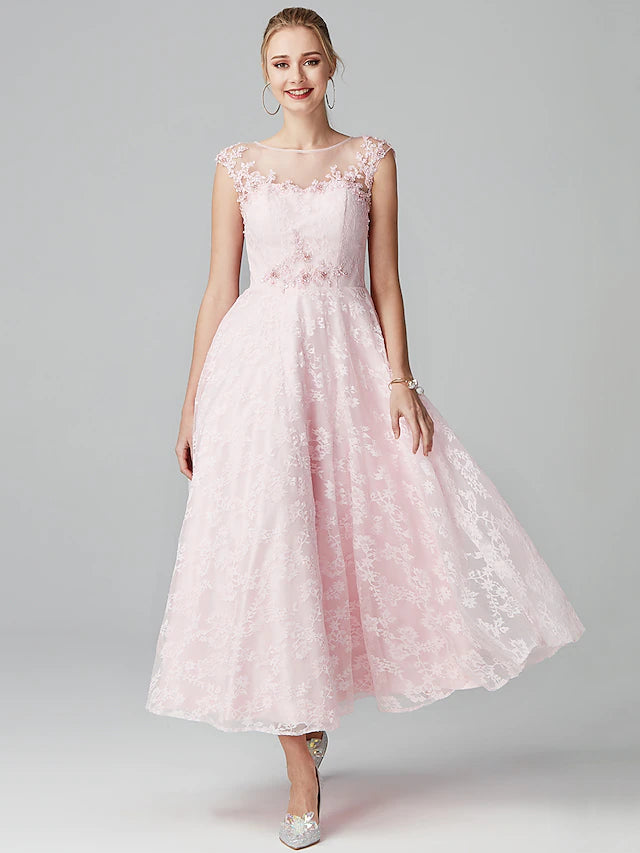 Model wearing an elegant A-line floral lace prom dress with illusion neckline and short sleeves.