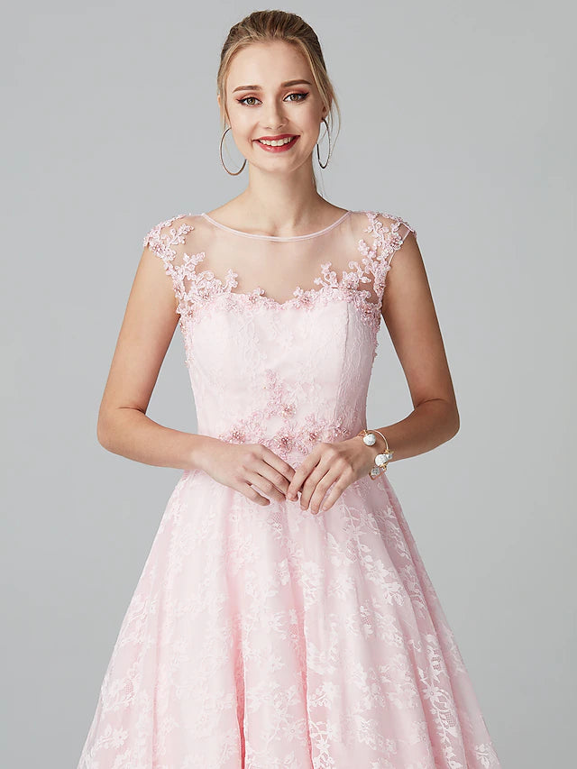 Model posing in the A-line floral lace dress, showcasing its elegant silhouette.