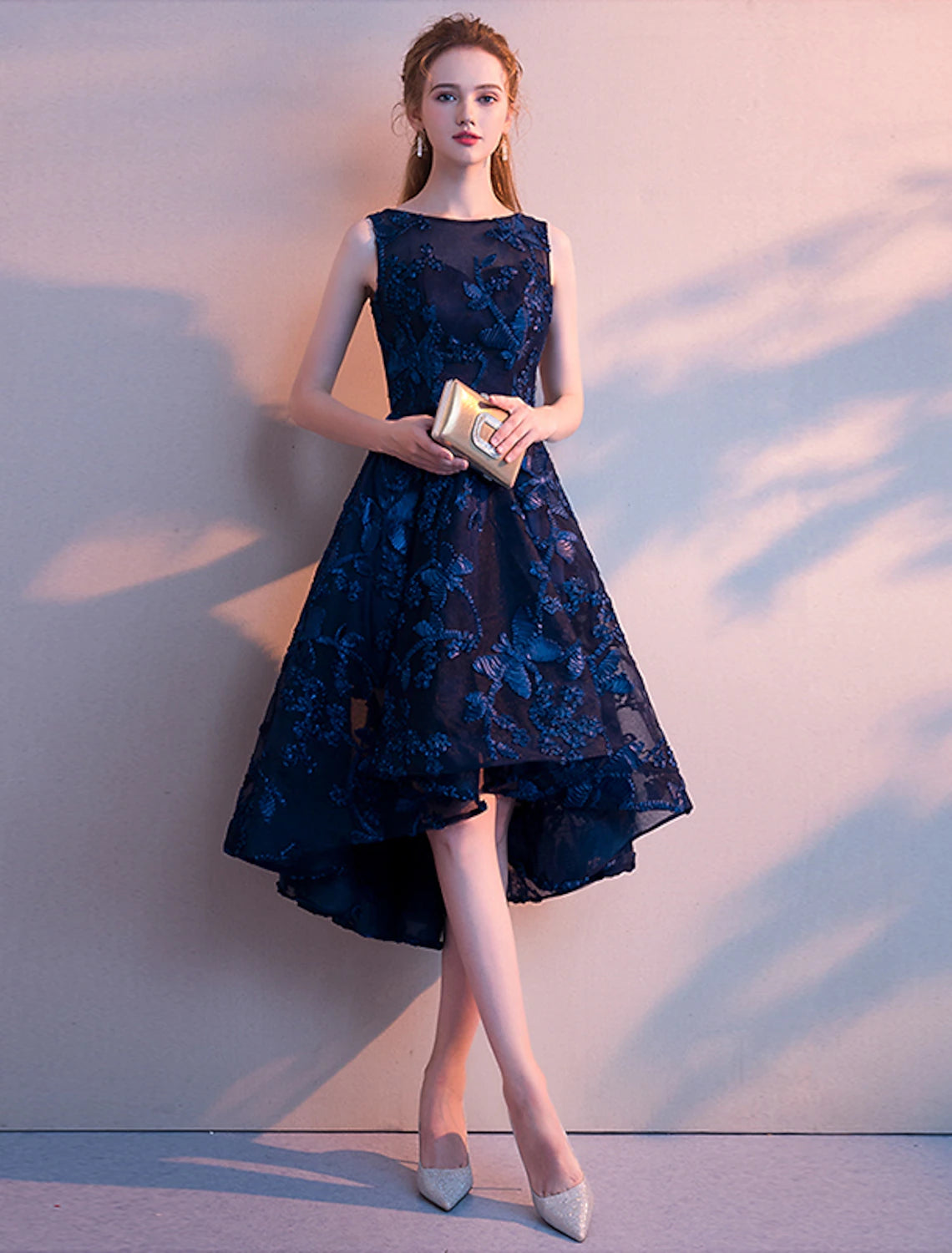 Teal A-line midi cocktail dress with jewel neck and pleated skirt.