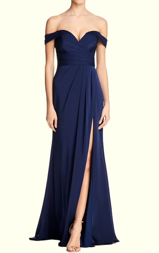 Close-up of the off-shoulder neckline and fabric detail of the prom dress.