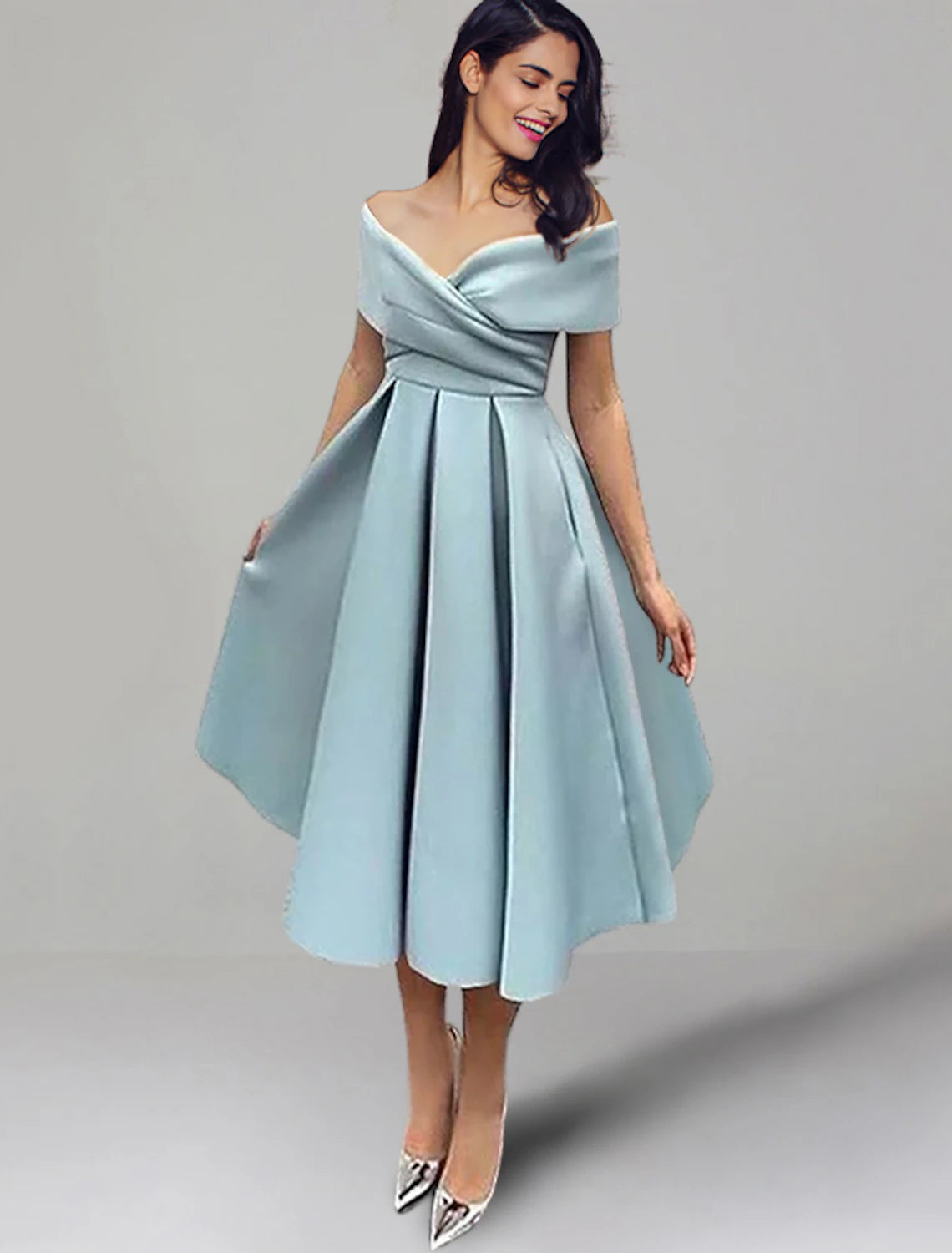 Close-up of ruched detail on the off-shoulder satin dress.