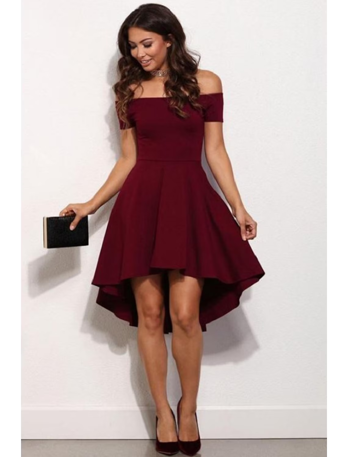 Model wearing a pure color A-line off-shoulder short sleeve mini dress made of stretch satin.
