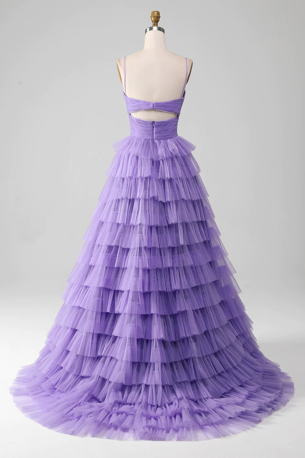 Side view of a model in a purple A-line off-shoulder tulle dress.