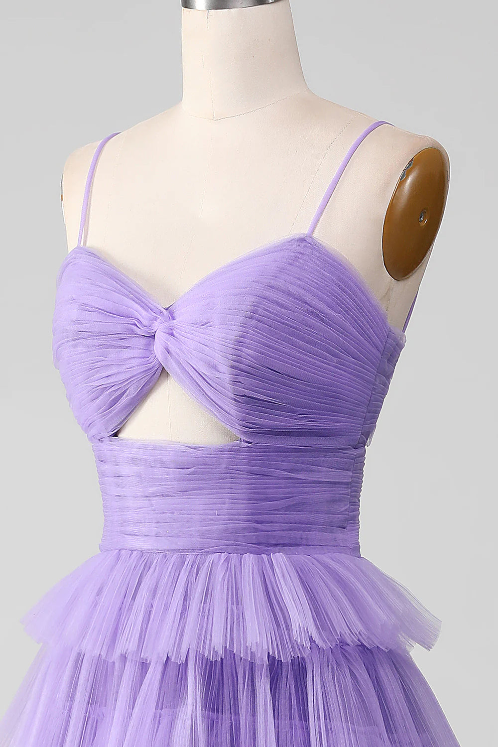 Full length view of a model posing in the purple A-line prom dress.