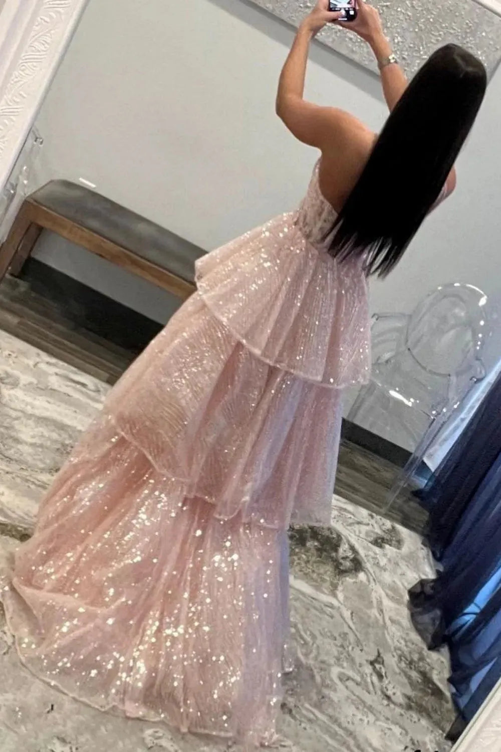 Back view of the A-line one-shoulder long prom dress, highlighting the flowing skirt.