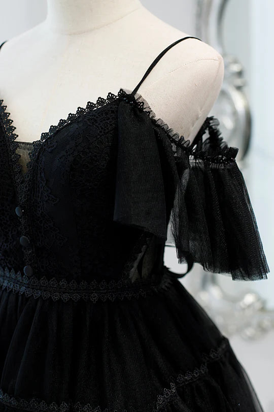 Close-up of the plunging V-neck and tulle straps on the homecoming dress.