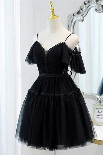 Detail of the tulle fabric and strap design on the homecoming dress.