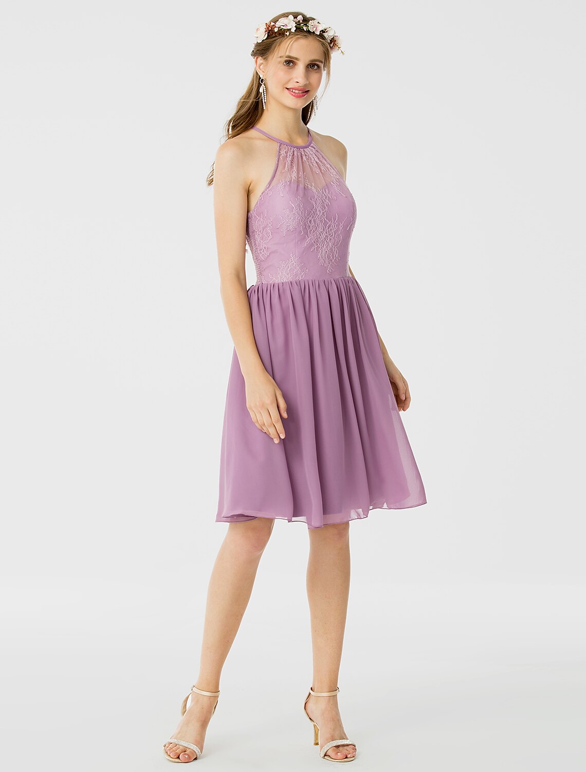 Close-up of chiffon and corded lace fabric on bridesmaid dress.