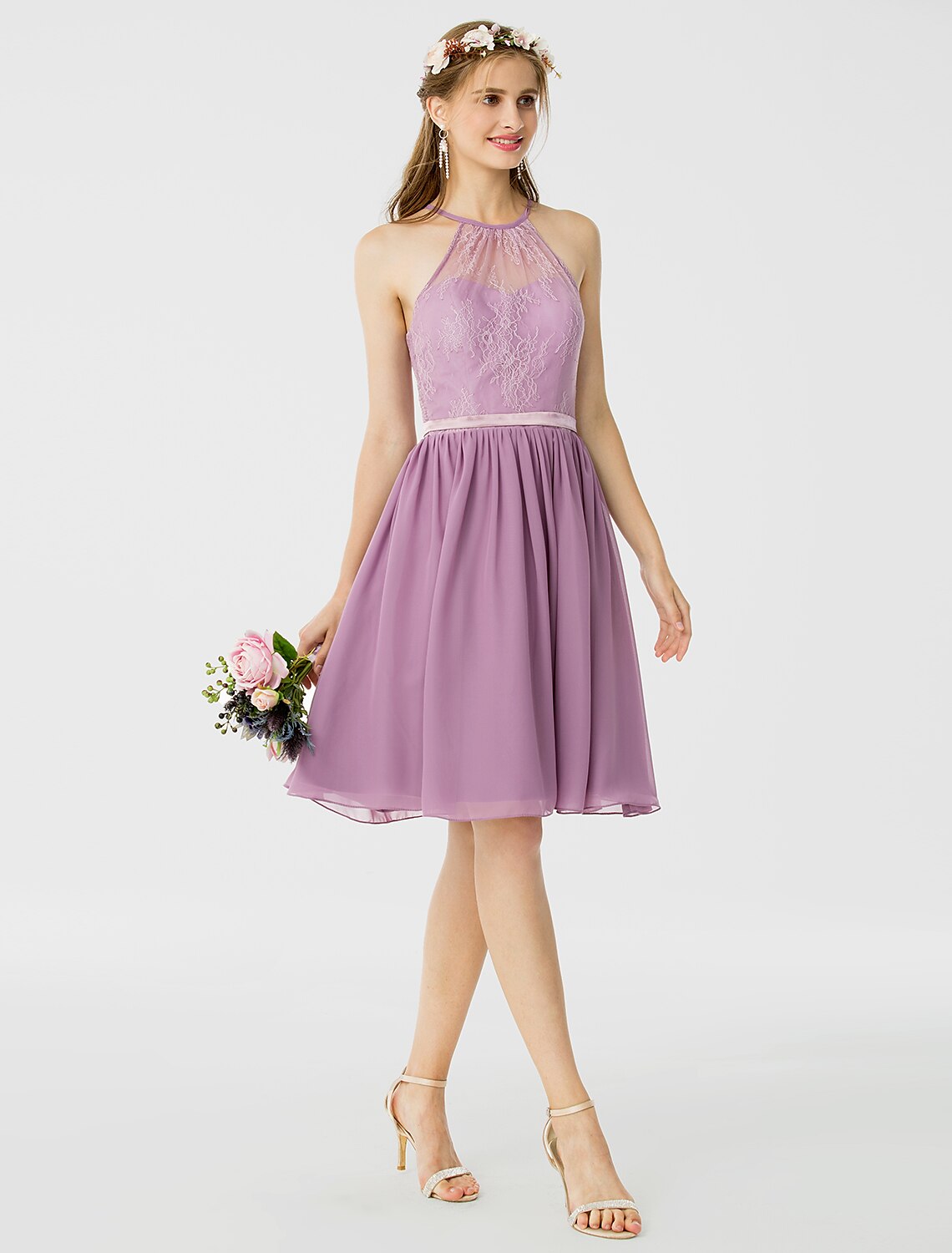 Model wearing knee-length halter neck dress.