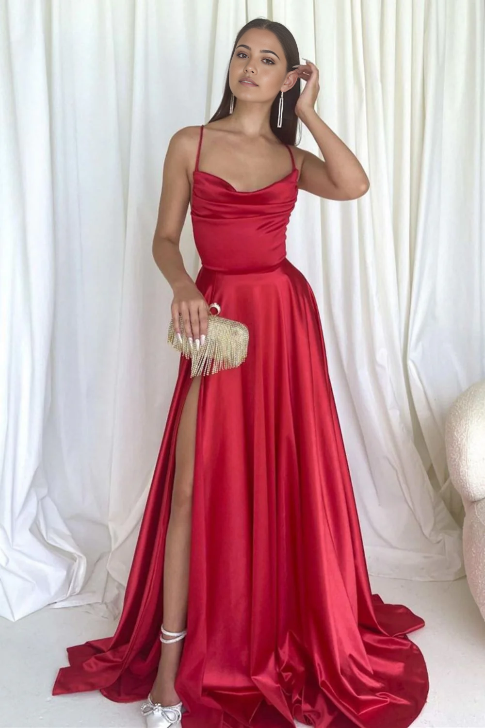 Back view of a red A-line long prom dress, highlighting the elegant criss-cross strap design.