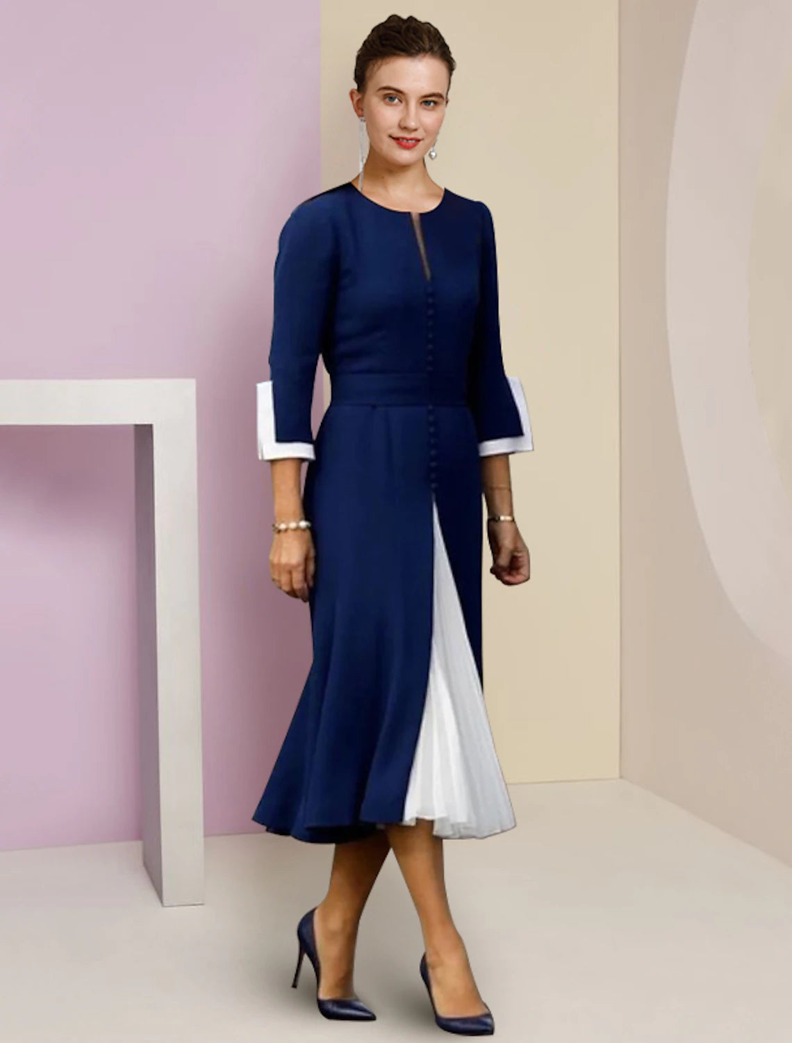 Side profile of the color block A-Line dress, highlighting the stretch chiffon fabric.