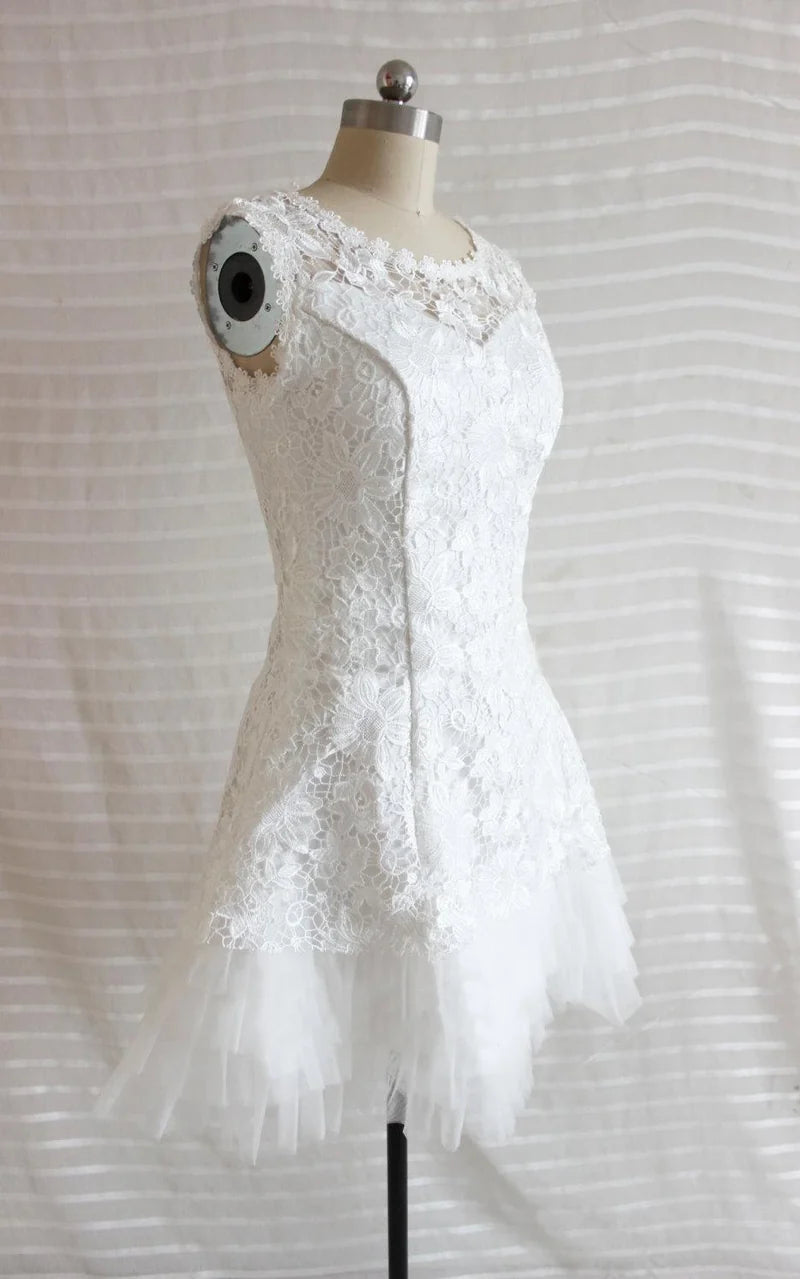 White A-line short wedding dress with lace bodice and satin skirt.
