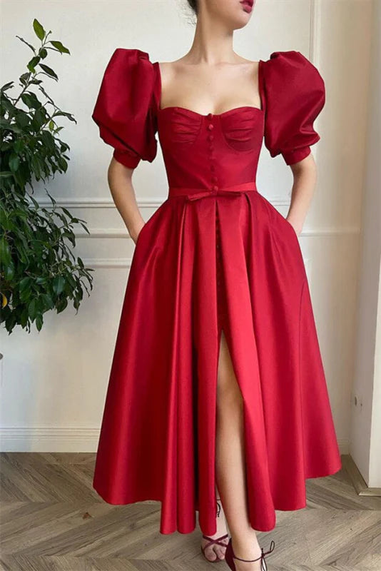 Model wearing a short A-line prom dress with square neckline and short sleeves.