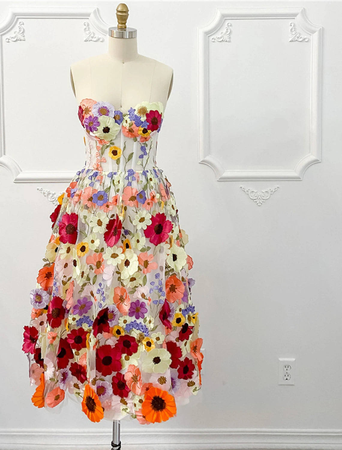 A-line strapless floral tulle cocktail dress with appliques.