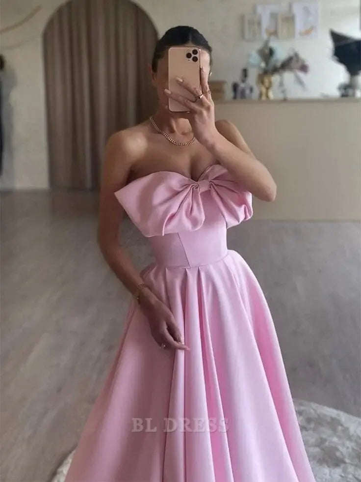 Full view of the pink satin strapless evening gown.