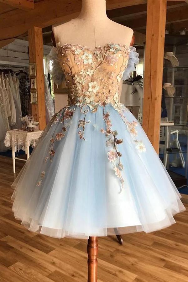 Woman wearing an A-Line sweetheart appliques ankle-length homecoming dress.